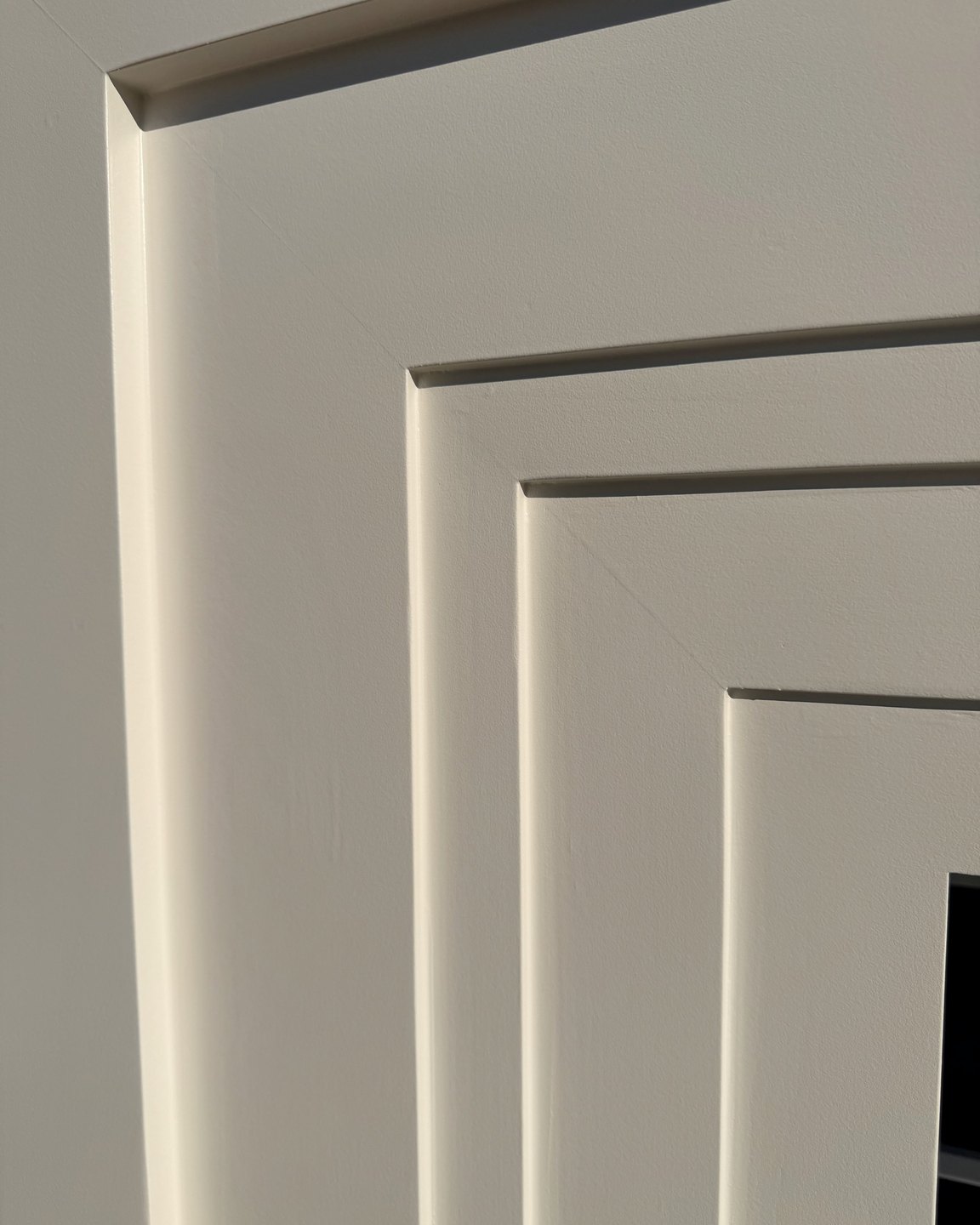 Close-up of the painted profile, each layer of trim stepping in from the one before it