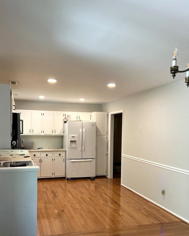 The adjoining kitchen during the works, with the run of cabinetry in place
